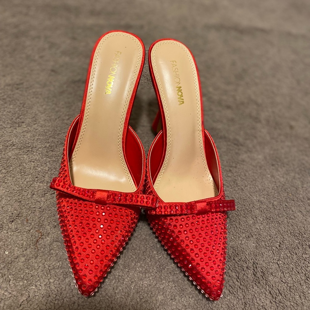 Brand new ruby red heels Fashion Nova